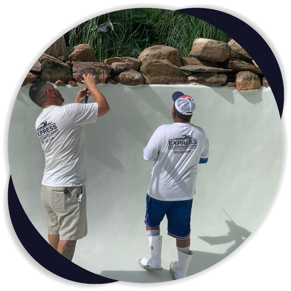 pool contractors working on the outer surface of pool