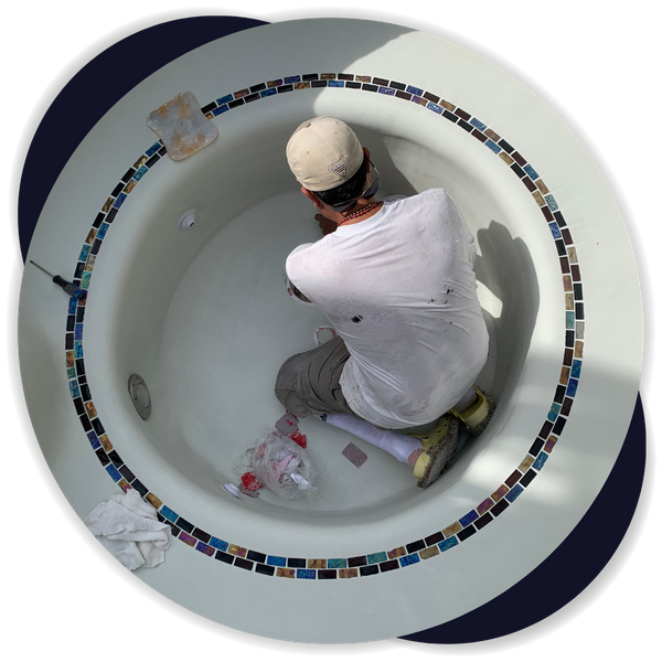 contractor inside of small empty pool
