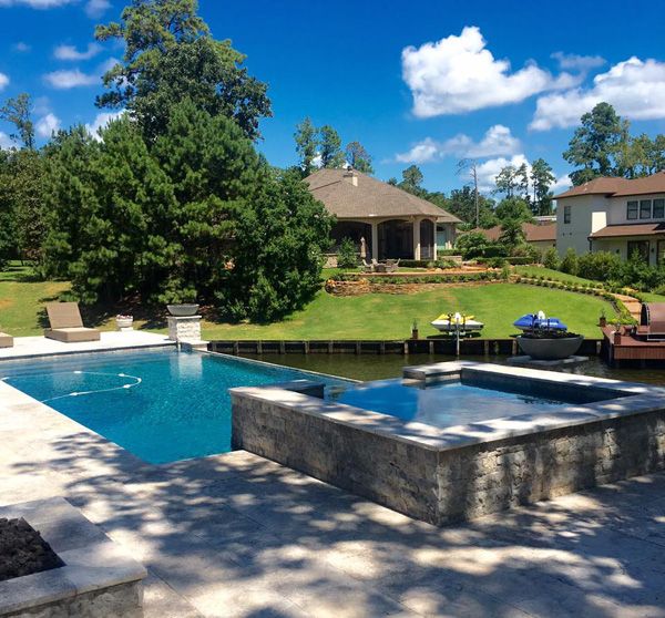 Houston pool and raised spa overlooking open water