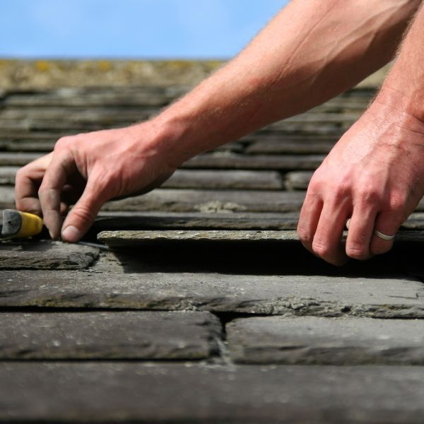 Placing roof slate tiles