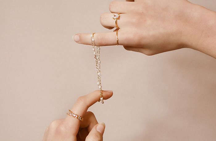 Closeup of hands with jewelry