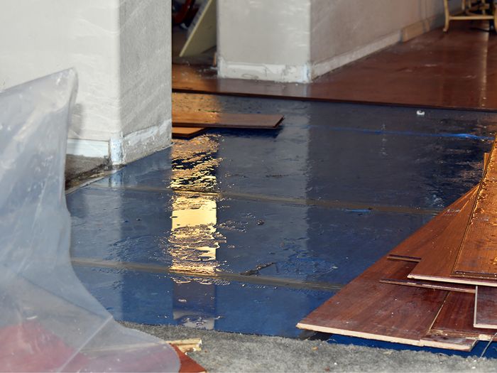 flooded basement, flooring being removed