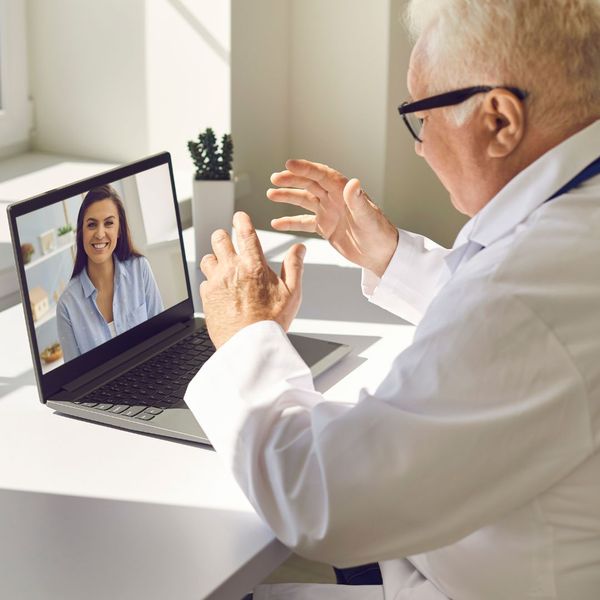 woman talking to a doctor on a telehealth call