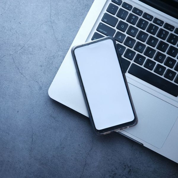 cell phone and laptop cell phone and laptop