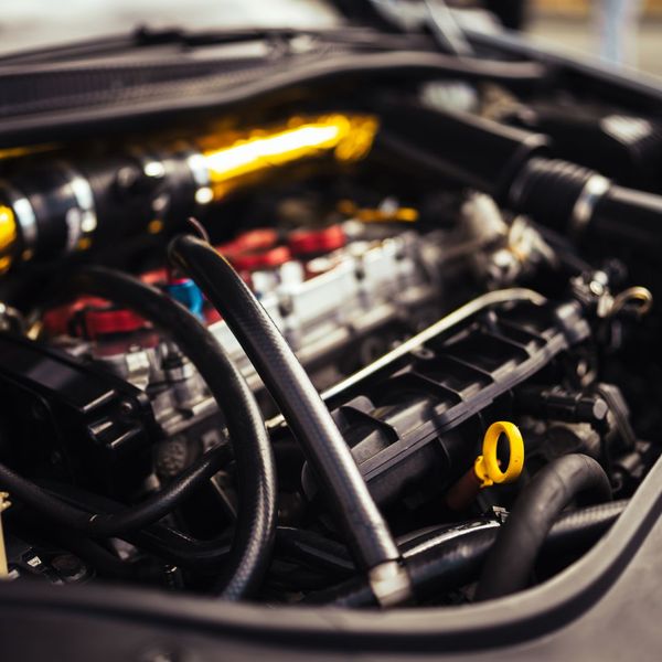 close up of an engine bay on a car close up of an engine bay on a car
