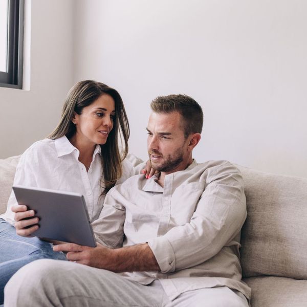 Couple looking at tablet