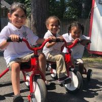 kids-in-uniform-on-bike-5d2f44d56f890-250x250.jpg