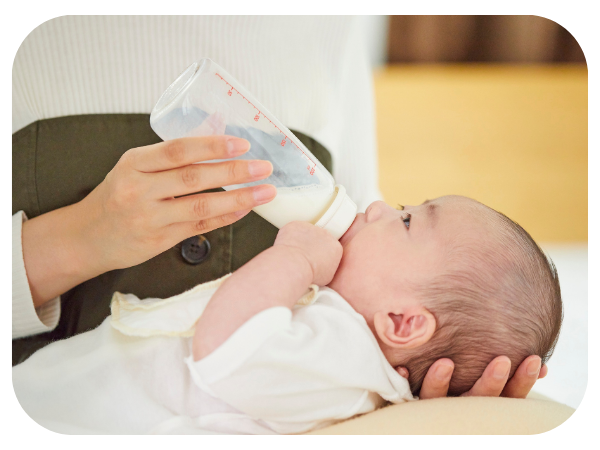 baby drinking from bottle baby drinking from bottle