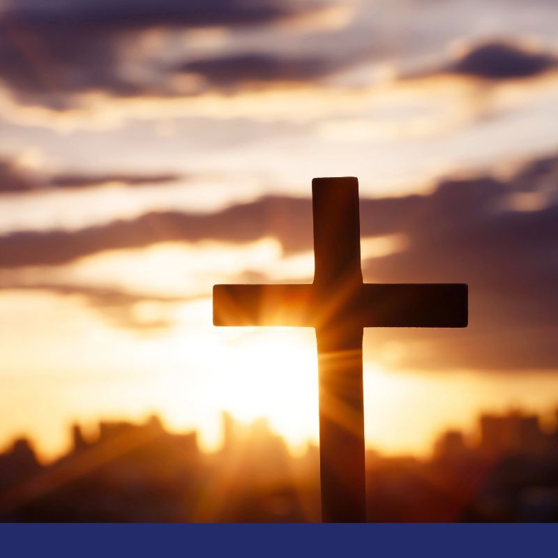 cross with sunshine behind it