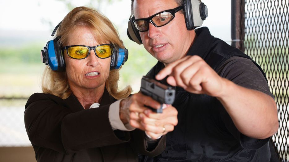 instructor and student at concealed carry class