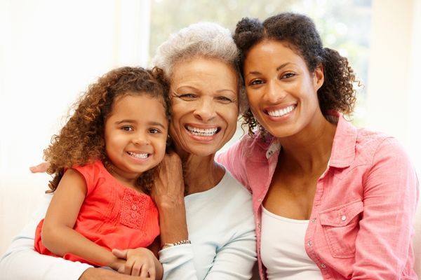 three generations of women sit together