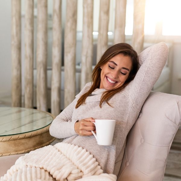 image of a woman comfortable at home