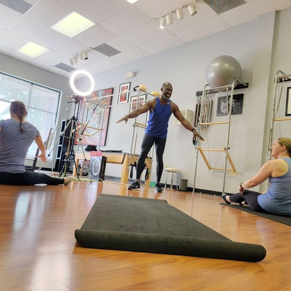 active, happy instructor teaching class
