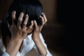 bigstock-Woman-Lying-On-The-Floor-Cryin-343343566.jpg
