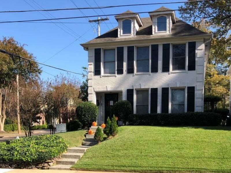 house with nice mowed lawn