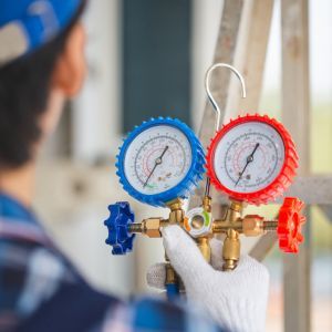 img of someone working on hvac equipment 