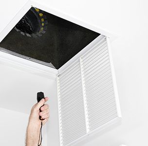 Image of air vents being cleaned