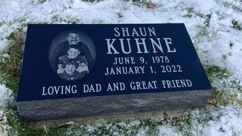 etched image of family 