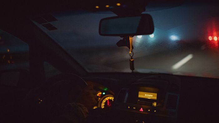 view through windshield at night