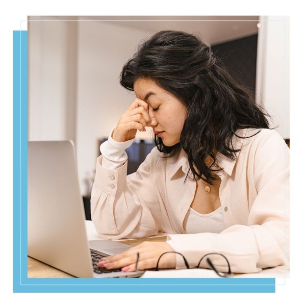 tired woman using laptop tired woman using laptop