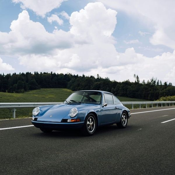 A vintage car driving