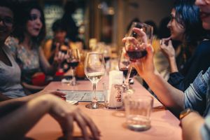 People Talking At a Restaurant Drinking Wine.jpg