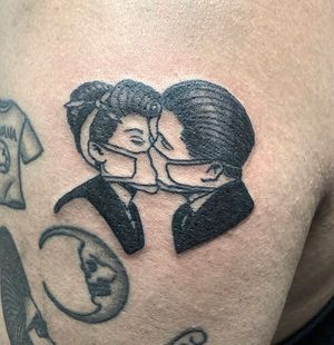 Covid-Tattoo-Couple-Masked-Kissing-625d96fd4f512.jpg