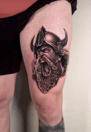 Black and grey viking portrait, realistic tattoo, thigh tattoos for men