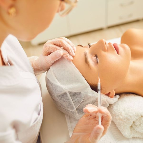 woman receiving cosmetic injectable