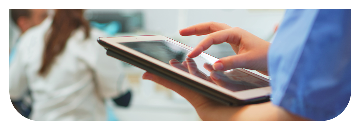 image of a nurse using a tablet