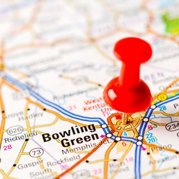 an atlas with a pin on bowling green