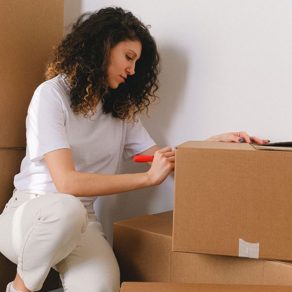 woman labeling boxes