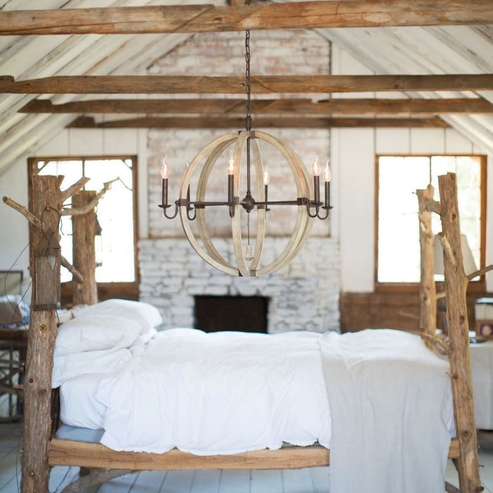 wood chandelier in rustic looking room