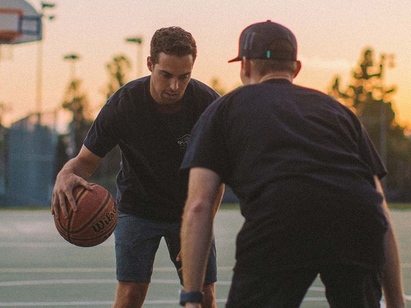 Photo of people playing basketball Photo of people playing basketball