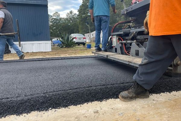 Asphalt paving and sealcoating.