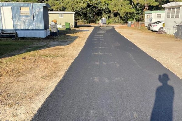 Asphalt paving and sealcoating.