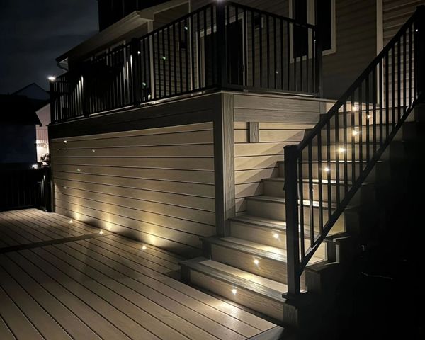 custom deck lit up at night