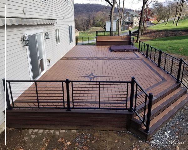 large new brown deck, black railing