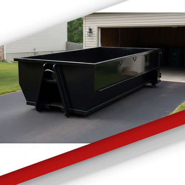 black dumpster in driveway