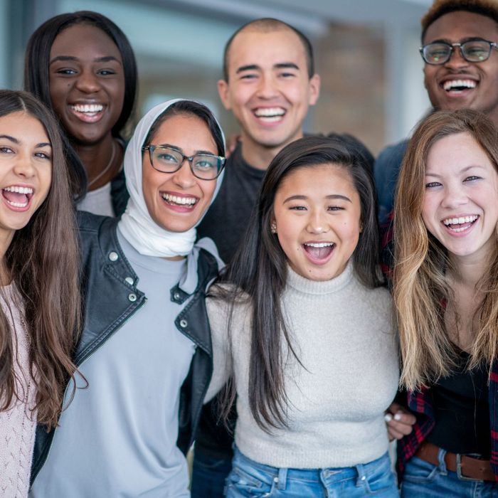 Diverse group of highschool students smiling