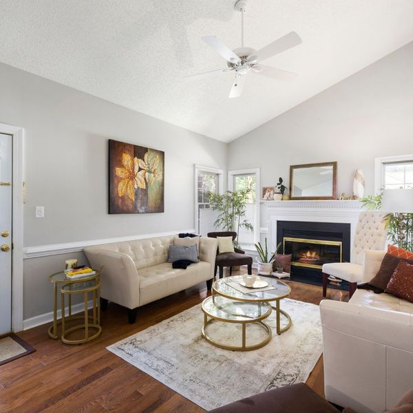 living room with a glass coffee table