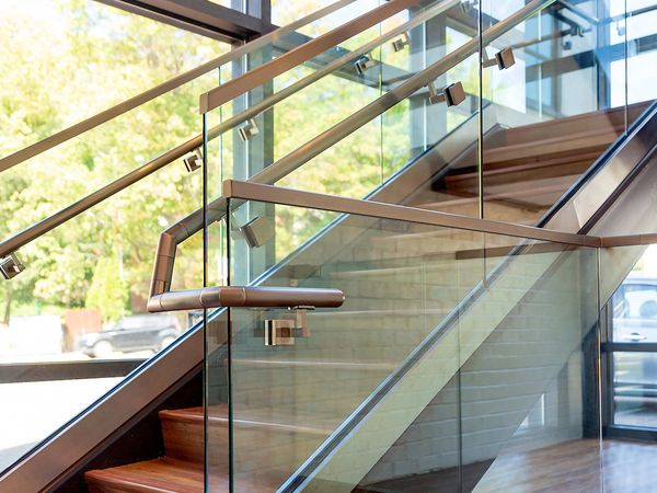 Glass divider for staircase