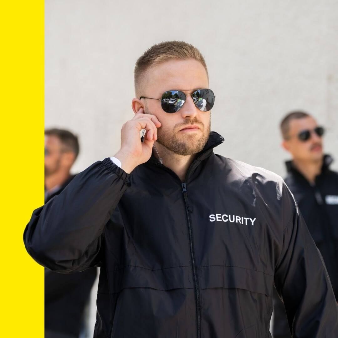 security guard listening to ear piece