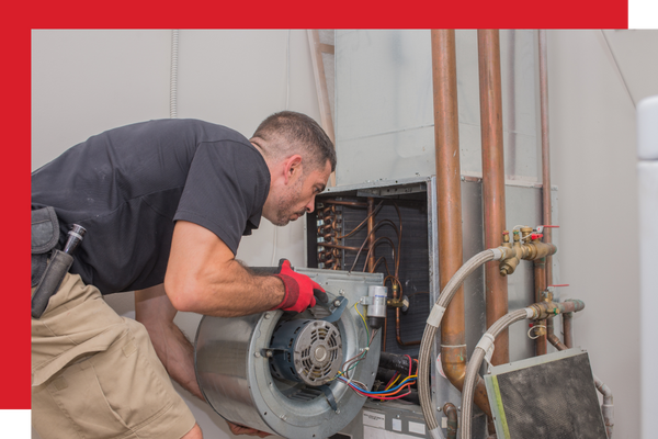 A focused HVAC technician, highlighting a detailed maintenance process. A focused HVAC technician, highlighting a detailed maintenance process.