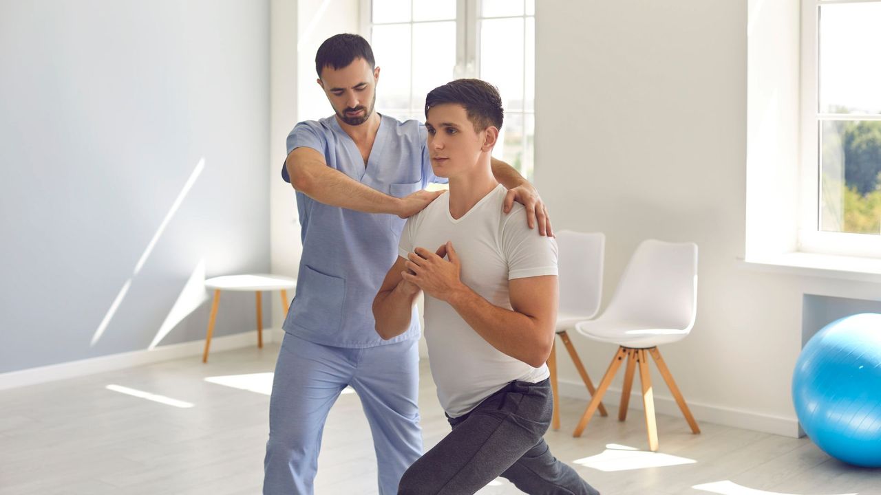 man in physical therapy man in physical therapy