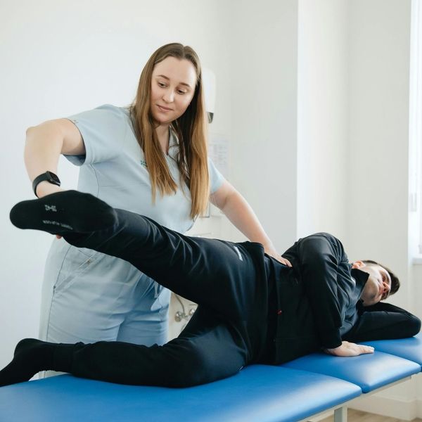 male athlete in orthopedic physical therapy