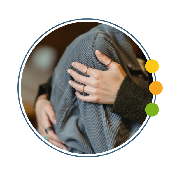 someone giving a person a supportive hug