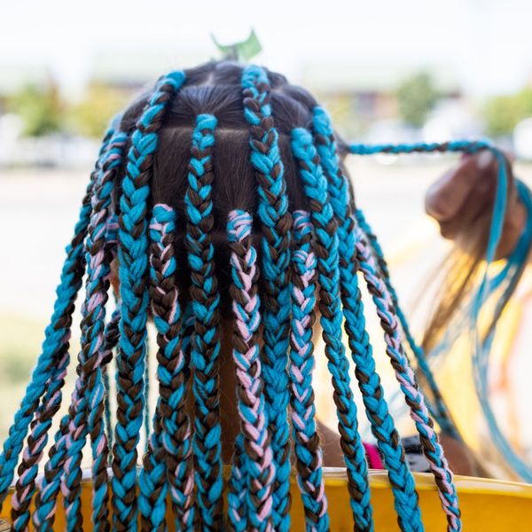 a girl getting her braids taken down a girl getting her braids taken down
