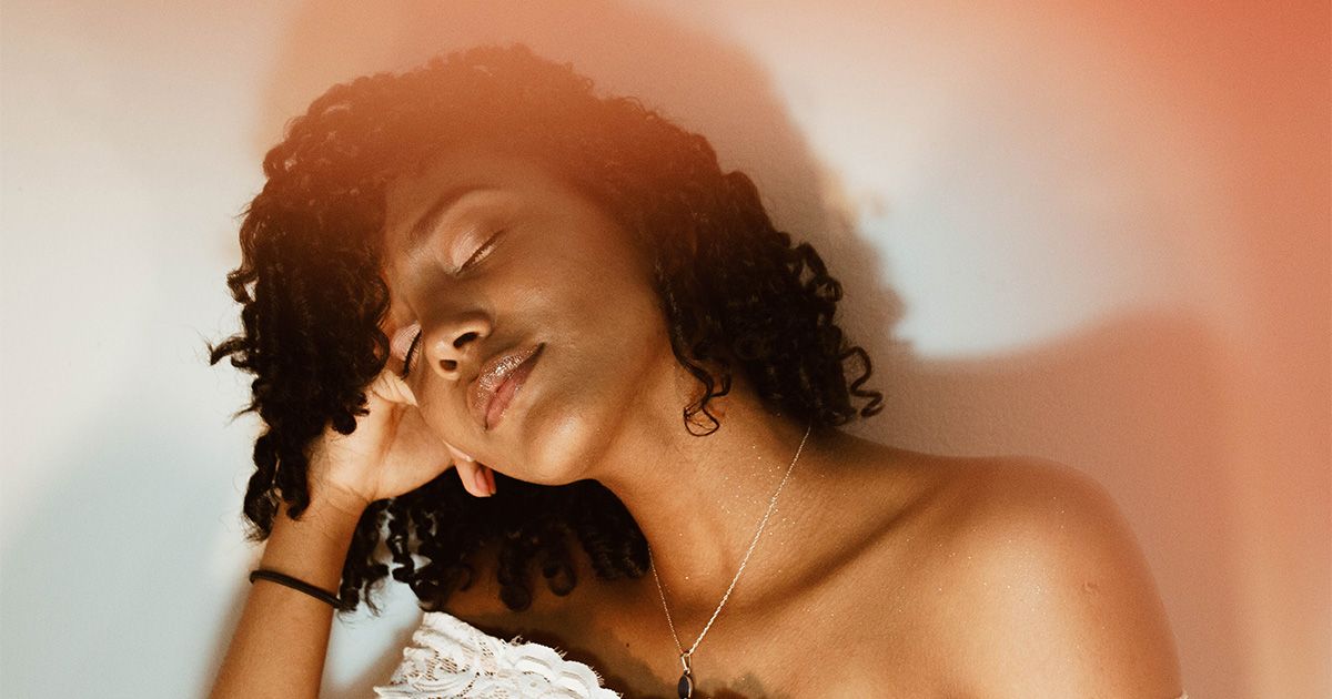 image of curly haired woman image of curly haired woman
