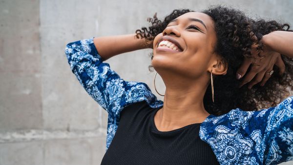 Woman touching her hair